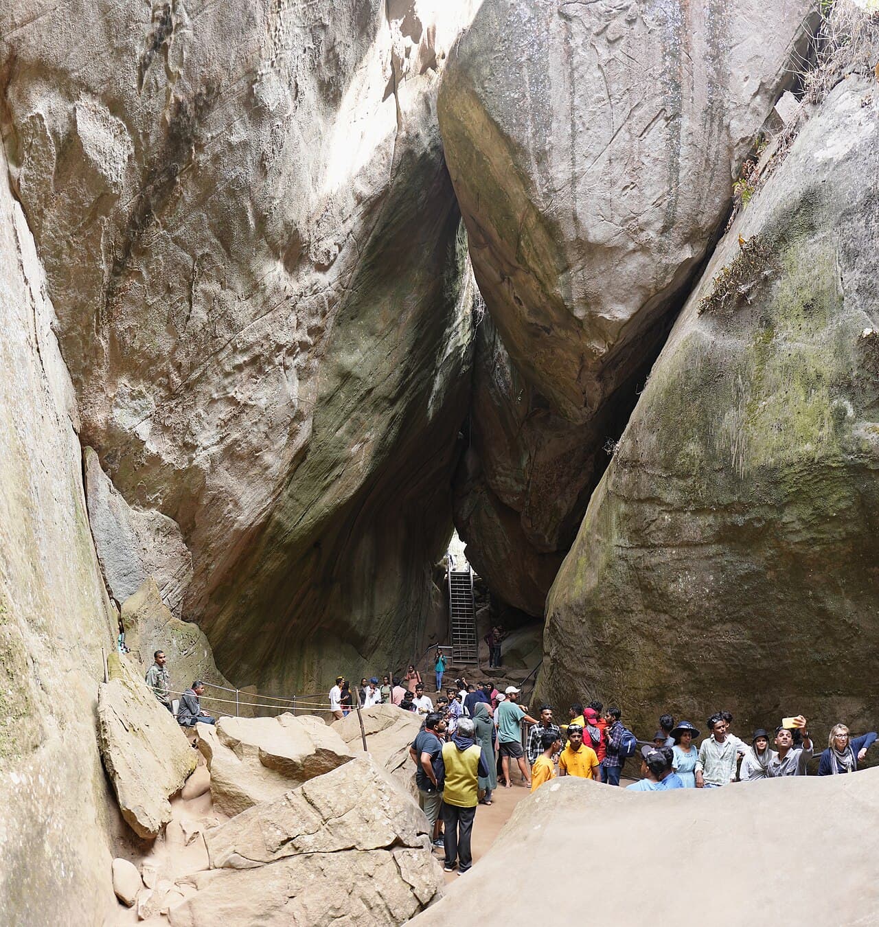 Rock interior and visitor path at Edakkal Caves